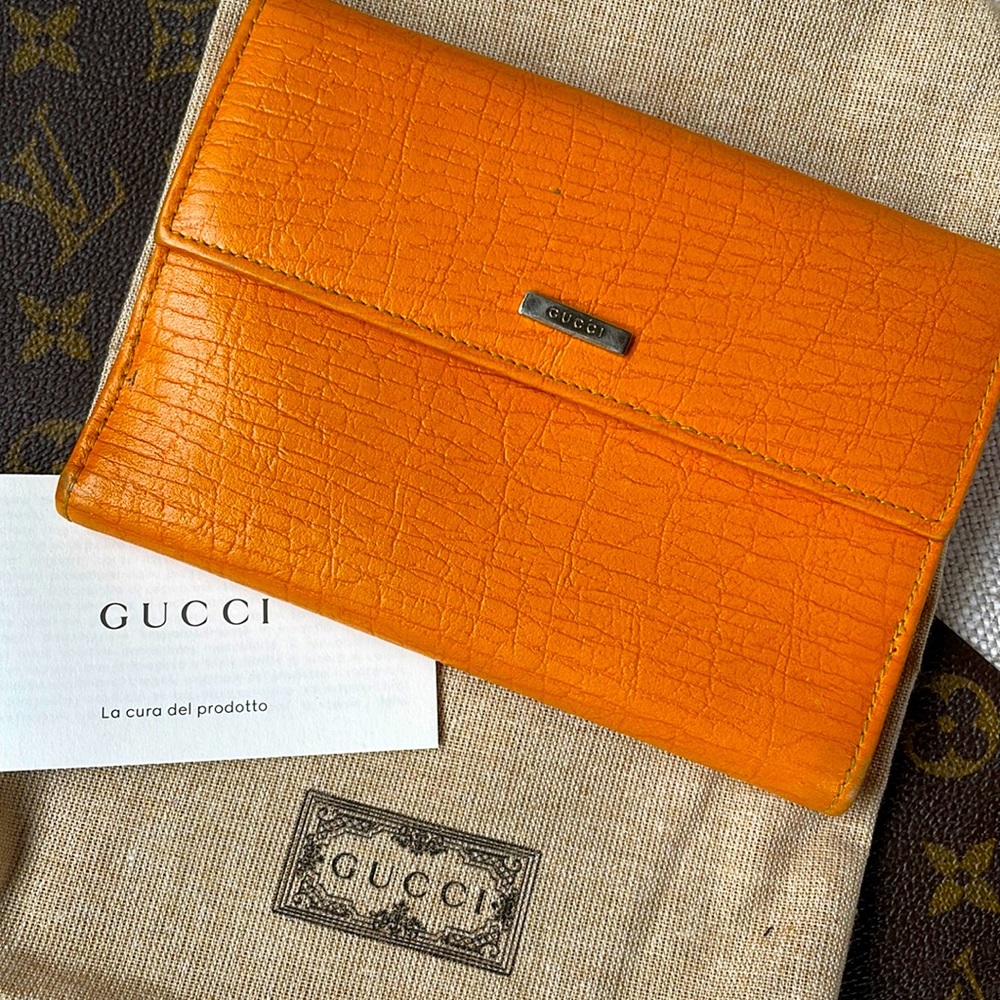 Vintage orange textured leather bi-fold wallet